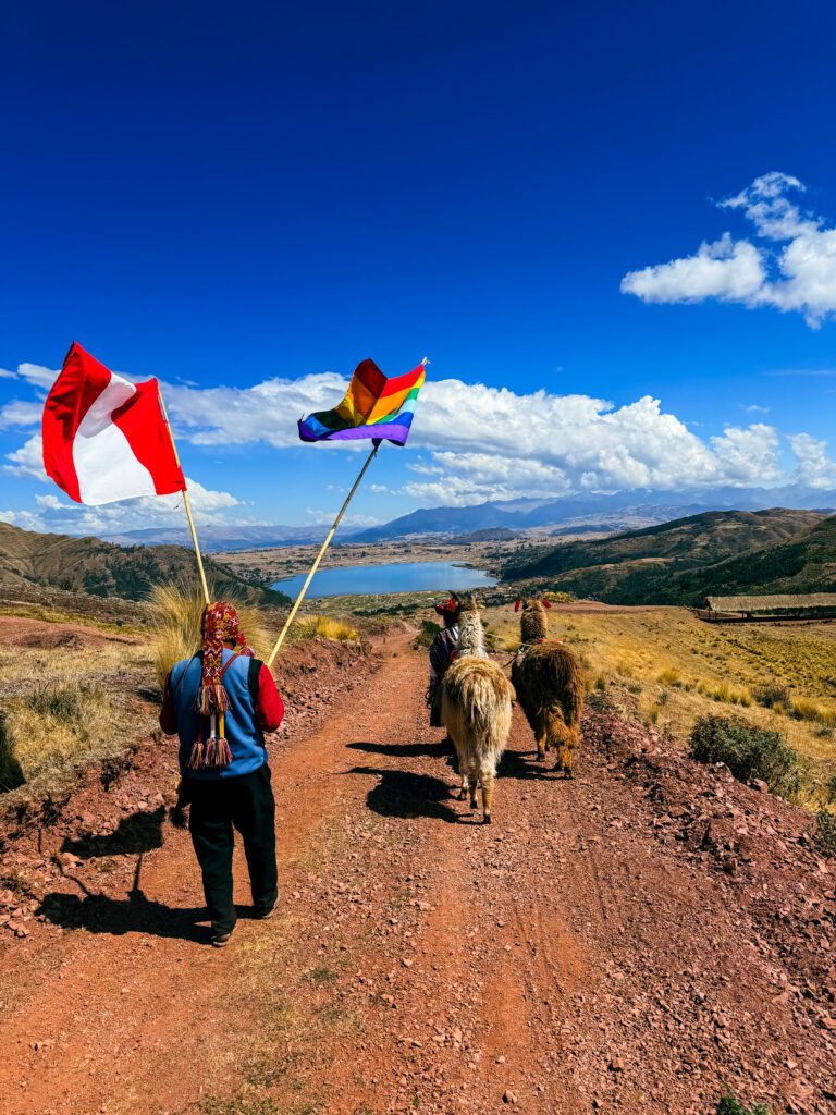 Man holding Peruvian flags